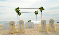 covered-chair-with-silver-ribbon-for-ceremony-area